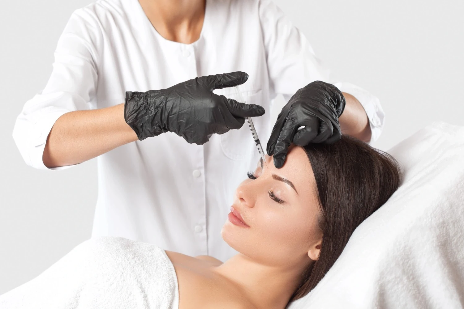 A woman getting a Dysport injection in Cary, NC